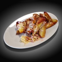 Картопля по-селянськи з сиром та беконом